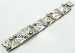 A white metal square link panel bracelet, 173mm lo