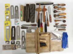 A mixed lot of tools including a Stanley leather c
