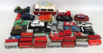 A quantity of play worn diecast vehicles, includin