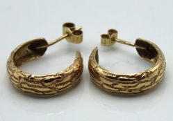A pair of 9ct gold hoop earrings, 17.25mm wide, 2.