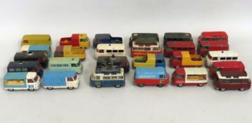 A quantity of play worn diecast Comma van vehicles
