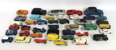 A quantity of play worn diecast vehicles including