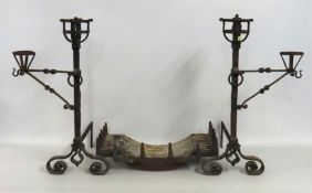 A pair of substantial wrought iron andirons/firedo