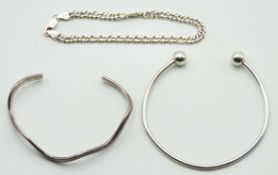 Two silver & white metal bangles twinned with a si