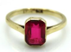 A 9ct gold ring set with pink sapphire, stone 7.5m
