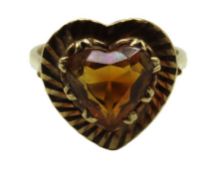A 9ct gold ring set with heart shaped citrine, sto