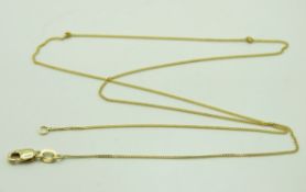 A 14ct gold chain, two knots, 440mm long, 1.2g