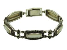 A silver art deco style bracelet set with marcasit