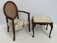 A Bergere style armchair, 850mm high to back twinn