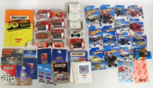 A quantity of 27 boxed diecast model vehicle packs