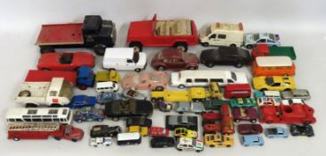 A quantity of play worn diecast vehicles, includin