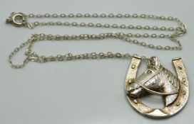 A silver chain with horse & horseshoe pendant, cha
