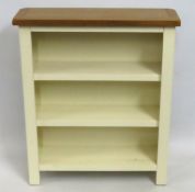 A small modern oak bookcase, 700mm wide x 220mm de