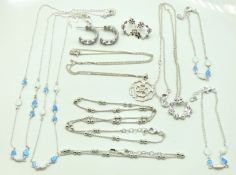 A quantity of silver & white metal jewellery items
