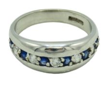 A contemporary 9ct white gold ring set with sapphi