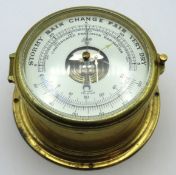 A brass wall mounted Schatz barometer, 180mm wide