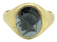 A 9ct gold centurion ring set with hematite, crack
