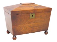 A small Regency period sarcophagus shaped rosewood