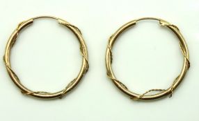 A pair of 9ct gold hoop earrings, 28mm diameter, 1