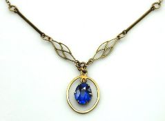A 9ct gold necklace set with possibly tanzanite st