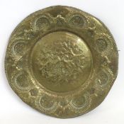 A 17th/18thC. brass alms style dish with embossed