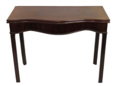 A 19thC. mahogany serpentine fronted card/games ta