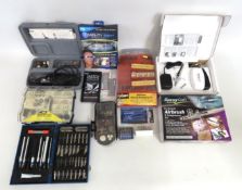 A Dremel drill twinned with various modelling dril