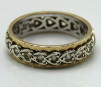 A 9ct gold eternity ring set with white topaz, 3.3