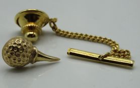 A 9ct gold Tiffany & Co. style golf ball & tee tin