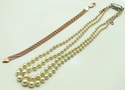 A gold plated silver mesh bracelet 180mm long, twi