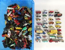 A quantity of play worn diecast vehicles, includin