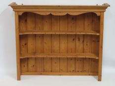 A pine dresser top, 1300mm at widest x 312mm at de