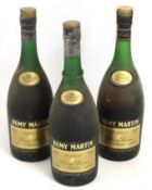 Three bottles of Remy Martin fine champagne cognac