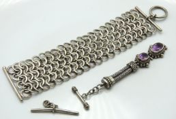A silver chain mail bracelet, a silver T-bar & a s