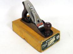 A boxed Stanley no. 4 plane, clean example