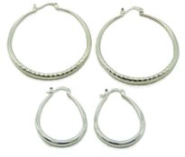 Two pairs of silver hooped earrings, 12.3g, round