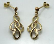 A pair of 9ct gold Celtic weave drop earrings, 24m