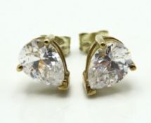 A pair of 9ct gold pear shaped white stone earring