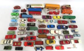 A quantity of play worn diecast vehicles, mostly Dinky & Corgi