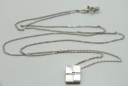 A 9ct white gold chain with contemporary pendant s
