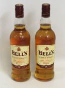 Two bottles of 8 year old Finest Old Scotch Bells