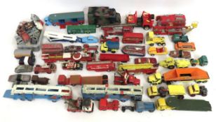 A quantity of play worn diecast vehicles, mostly Dinky & Corgi