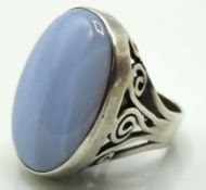 A large silver ring set with chalcedony stone, mak