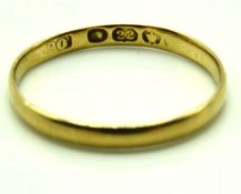 A 22ct gold band, some wear, size N/O, 1.4g