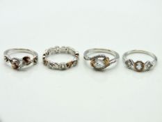 Four silver Welsh Clogau rings set with topaz, size L. 9.1g