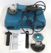 A Makita GA4530R angle grinder