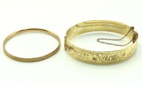 Two 9ct gold metal core bangles, 35.2g inclusive
