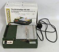 A boxed Proxxon KS 230 Bench circular saw, present