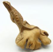 A Balinese lizard sculpture carved from parasite w