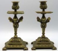 A pair of antique Empire style neoclassical brass